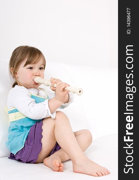 Happy little girl with instrument. Happy little girl with instrument