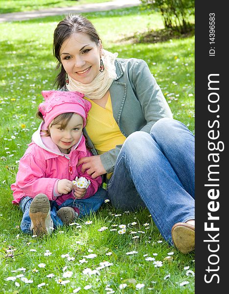 Sweet happy little girl in park