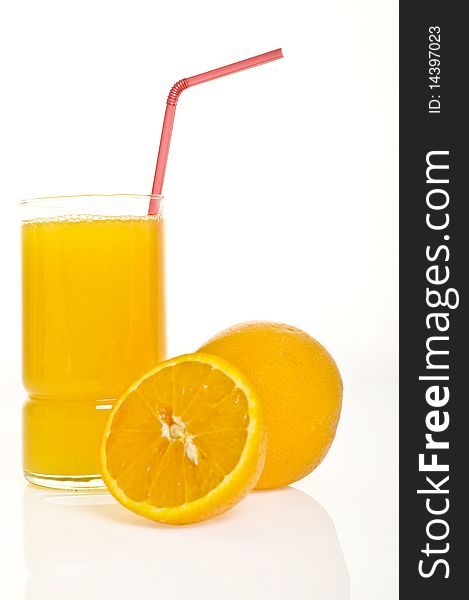 Sliced oranges and orange juice