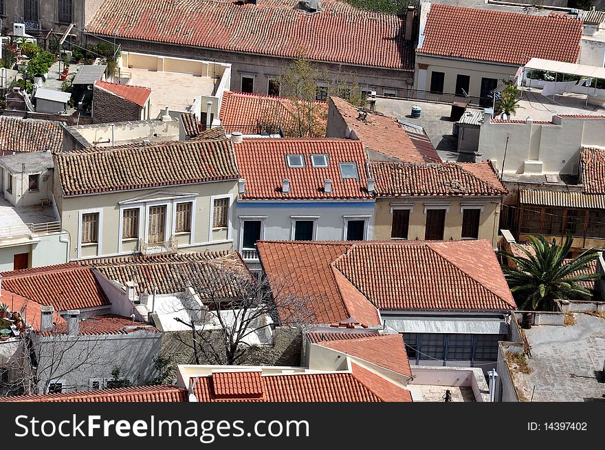 Aerial view of old red rooftops in a city