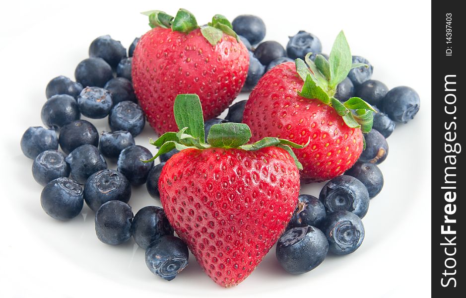 Fresh delicious strawberries and blueberries