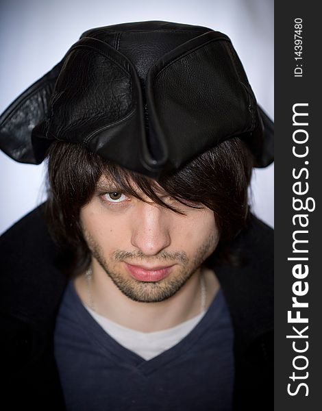 Young man with a beard in the pirate tricorn hat