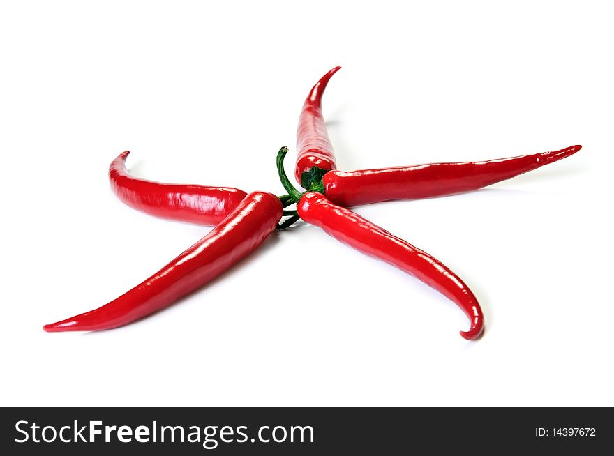 Red hot chilli cayenne pepper isolated over white