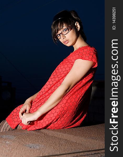 Portrait Of Sexy Young Woman In Little Red Dress