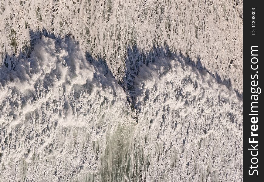 This shot of an oncoming wave was originslly taken on a vertical plane, 90 degrees from the horizontal presentation. In the course of changing the angle, a reverse optical illusion occurs. This shot of an oncoming wave was originslly taken on a vertical plane, 90 degrees from the horizontal presentation. In the course of changing the angle, a reverse optical illusion occurs.