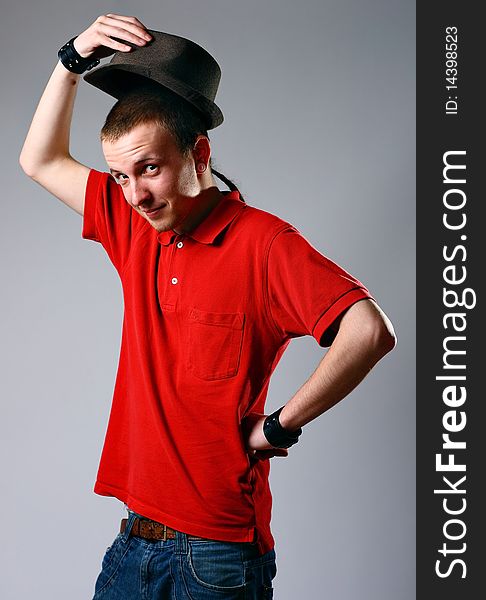 Close-up of a young man in hat