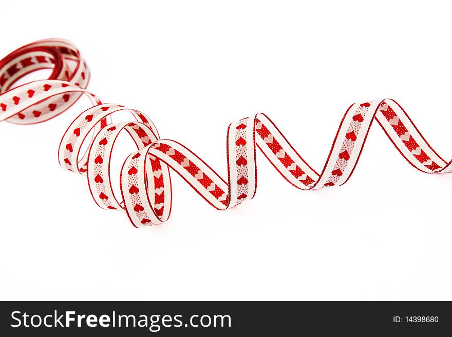 Ribbon with red hearts isolated on a white background