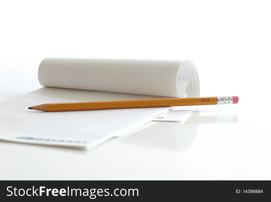 Notebook with the pencil on the white table. Notebook with the pencil on the white table