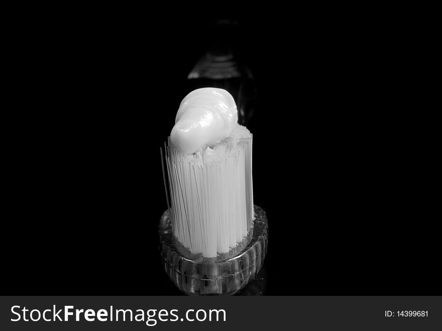 White toothbrush with black background
