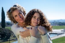 Free Mother And Daughter With The Blue Sky In The Background Royalty Free Stock Photo - 143916065