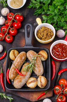 Fried Sausages In A Pan Royalty Free Stock Images
