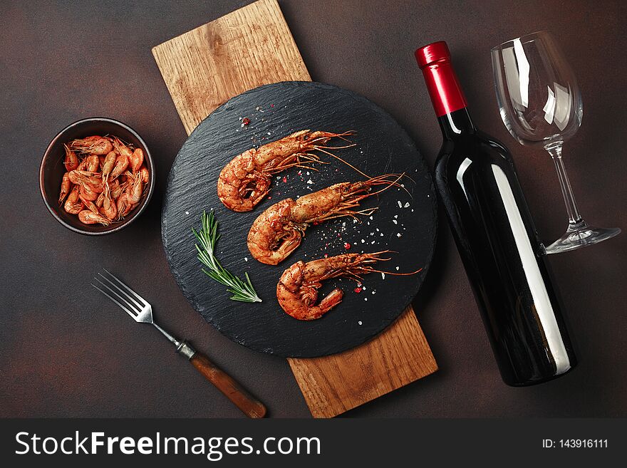 Shrimp With Bottle Wine On Rusty Background