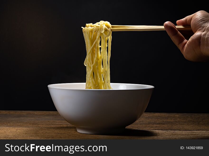 Red pork noodles ,bowl of noodles with vegetables