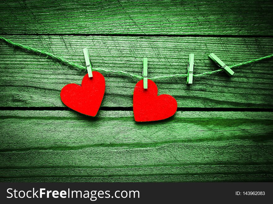A happy valentine`s day in love and clothes pegs. A happy valentine`s day in love and clothes pegs