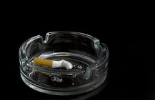 Cigarette In Ashtray Stock Images