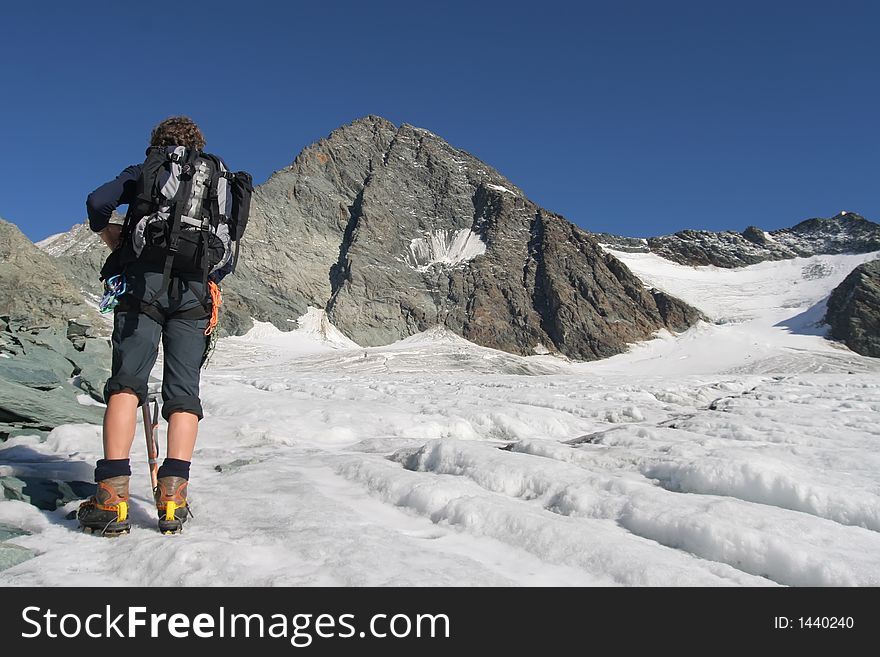 Climber on a mountain glacier. Climber on a mountain glacier