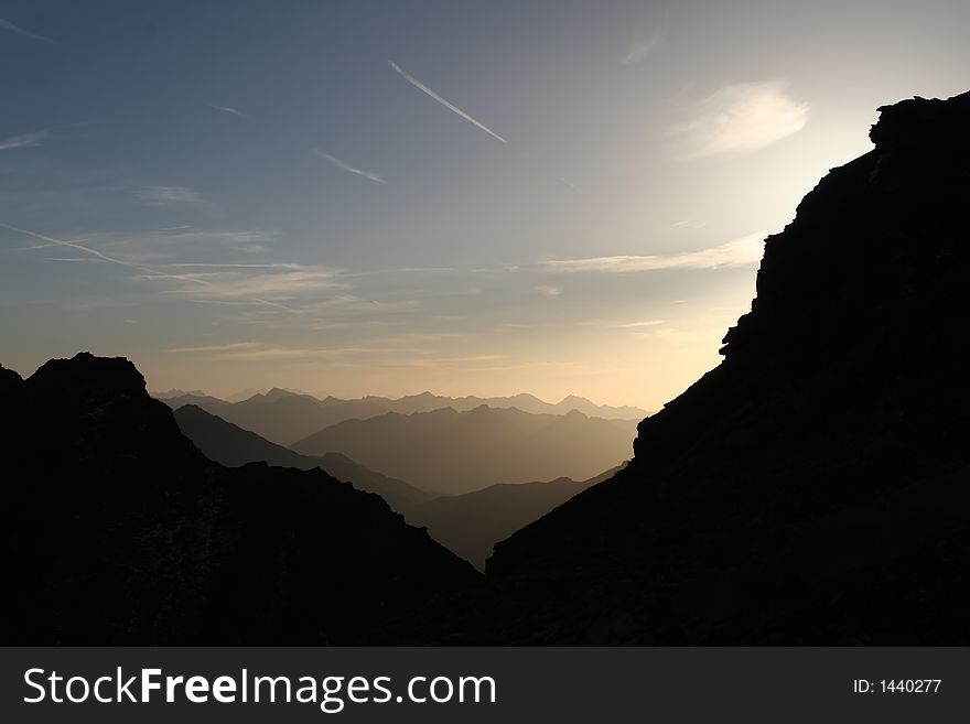 Mountain sunrise background. Layers of shades