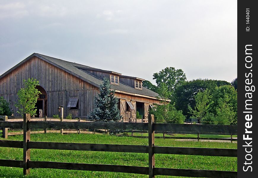 An old brown barn in the country in Pennsylvania. An old brown barn in the country in Pennsylvania.