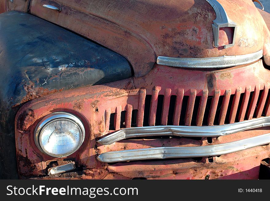 Car front showing rust and grunge. Car front showing rust and grunge.