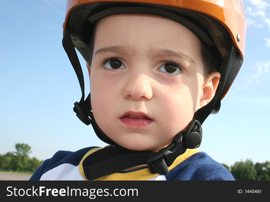 Three year old boy in bicycle helmet. Three year old boy in bicycle helmet.