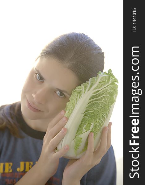 Pretty young woman with salad