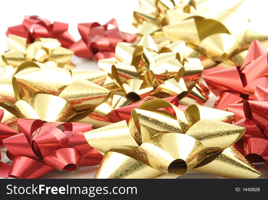 Gold gift ribbon on a white background