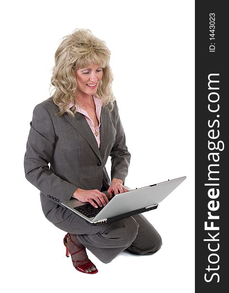 Business Woman Kneeling Working on Laptop