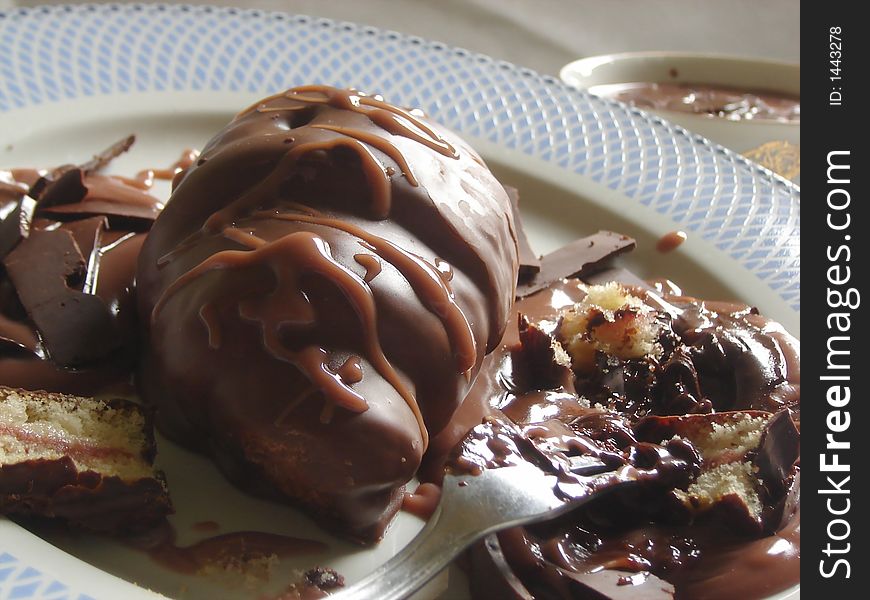 Chocolate croissant with dark chocolate and chocolate sauce