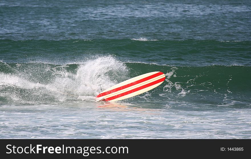 Surfer falls in the sea. Surfer falls in the sea