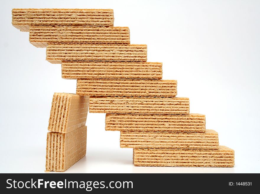 Steps made of wafers with a vanilla cream close-up