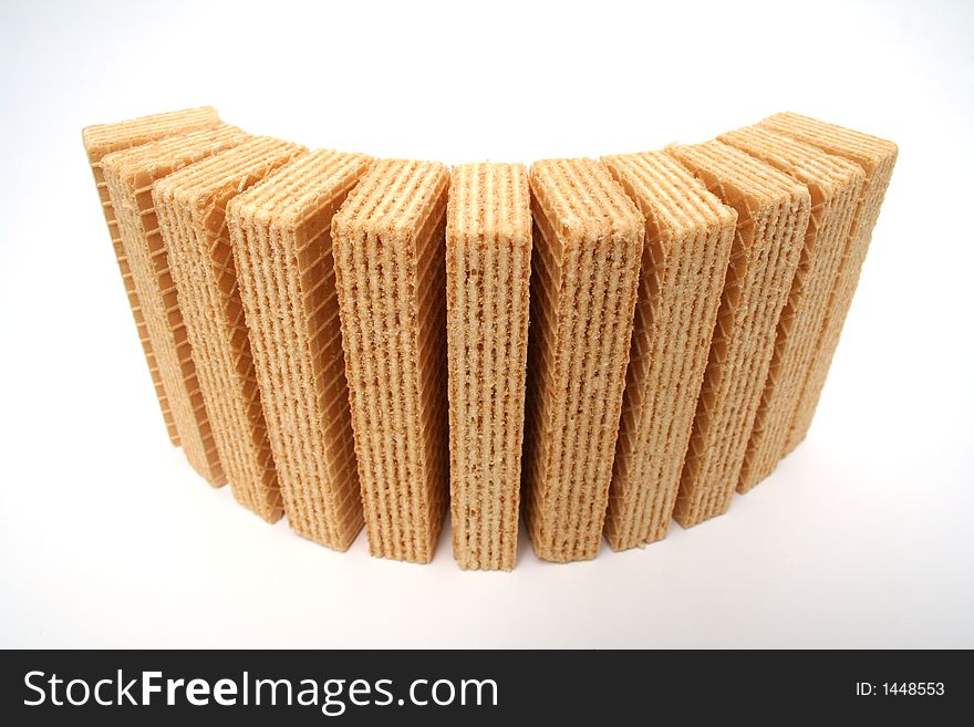 Wafers with a vanilla cream standing a semicircle the top view wide screen. Wafers with a vanilla cream standing a semicircle the top view wide screen