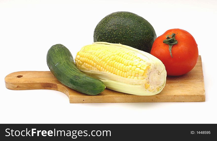 Cucumber, tomato, corn, avocado, isolated on white background. Cucumber, tomato, corn, avocado, isolated on white background