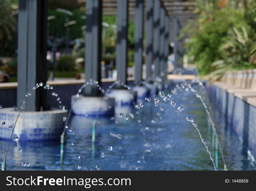 Pretty fountain in Marbella, Stop motion, droplets in mid-air. Pretty fountain in Marbella, Stop motion, droplets in mid-air.