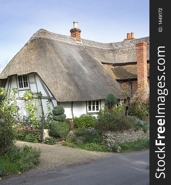 Quaint Thatched Village Cottage in a Rural England