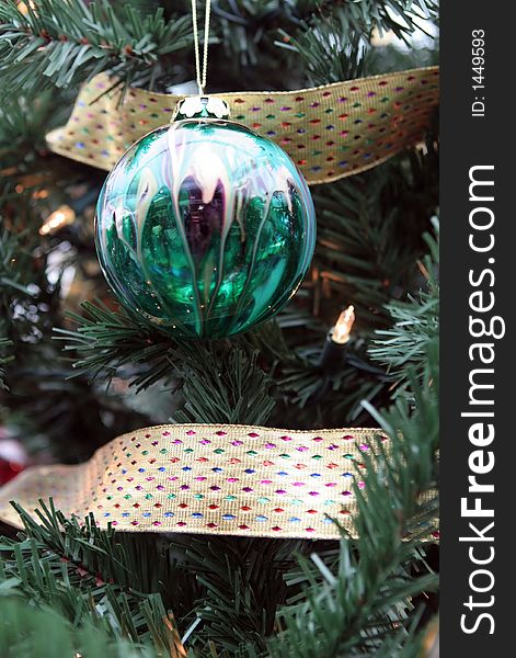 Glass ball Christmas decoration on a tree