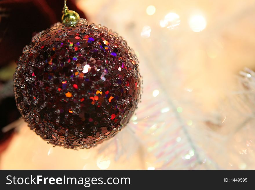 Glass ball Christmas decoration on a tree - focus on outside of ball