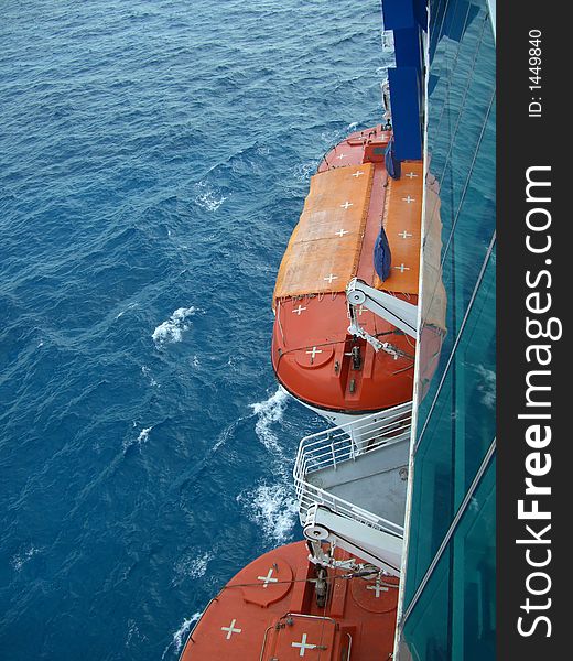 Cruise Ship Lifeboats over the Caribbean. Cruise Ship Lifeboats over the Caribbean