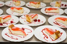 Raspberry Cheesecakes With Syrup Royalty Free Stock Photo