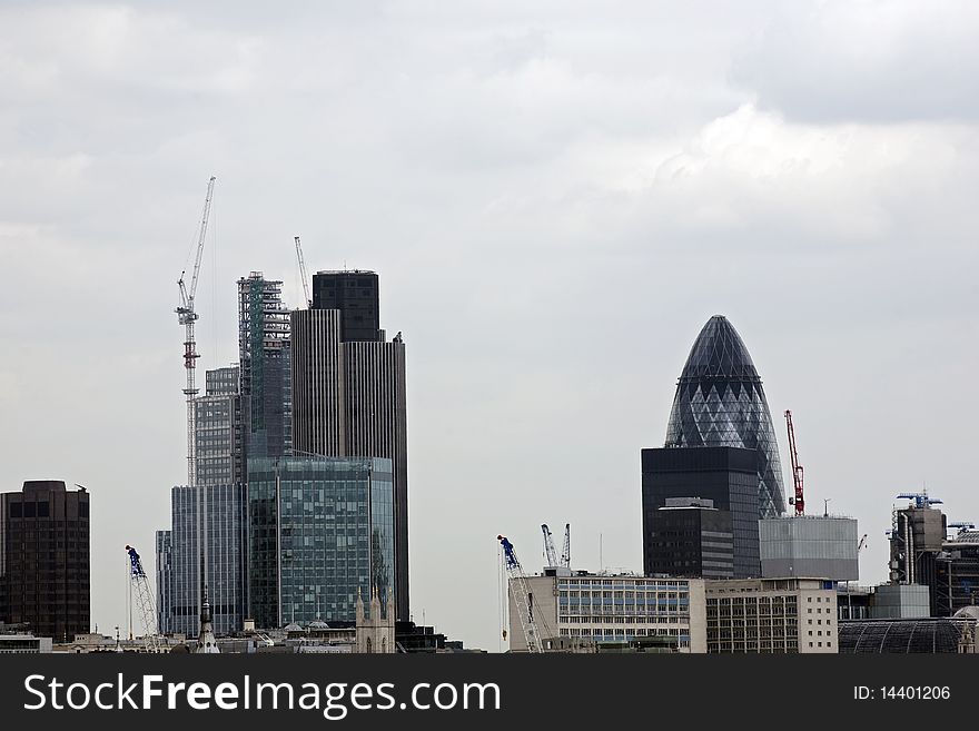 New constructions from London and building industry in cloudy day. New constructions from London and building industry in cloudy day