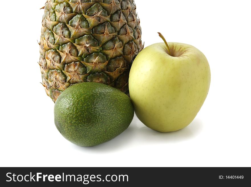 Apple pineapple and avocado on a white background. Apple pineapple and avocado on a white background