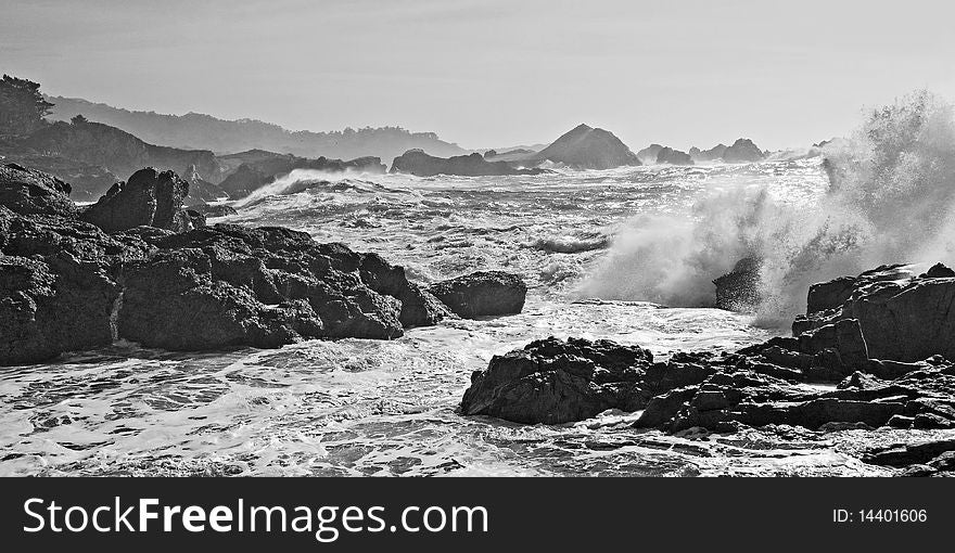 This photo of rocky tide pools of the California coast was taken in hazy sunshine and converted to monochrome. This photo of rocky tide pools of the California coast was taken in hazy sunshine and converted to monochrome.
