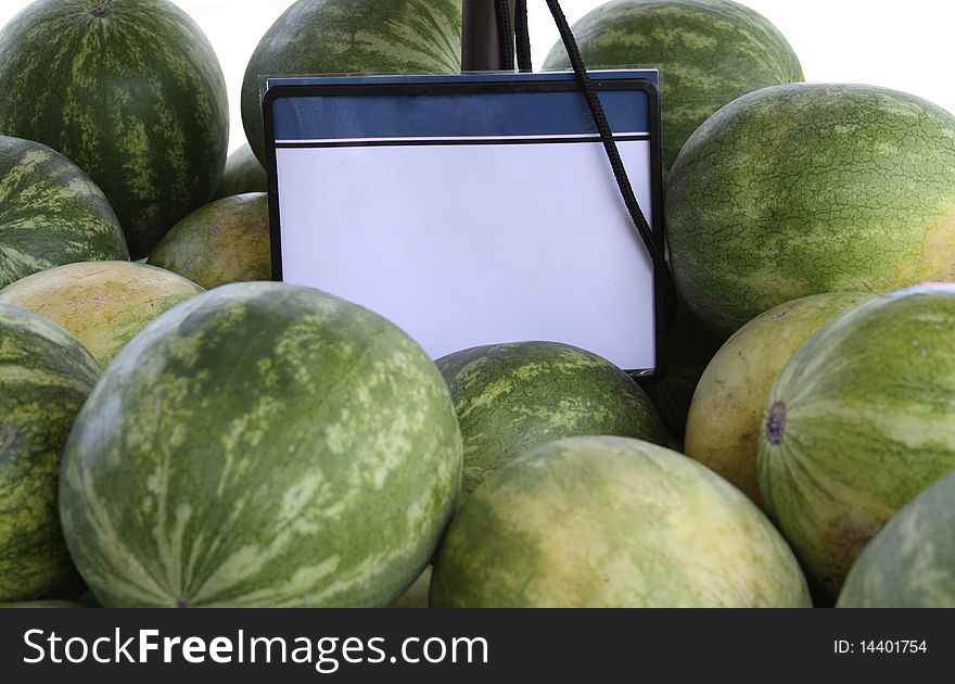Blank sign for text in watermelon stand. Blank sign for text in watermelon stand.