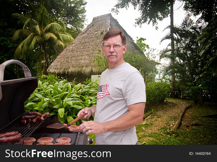 Mature Man Barbecuing