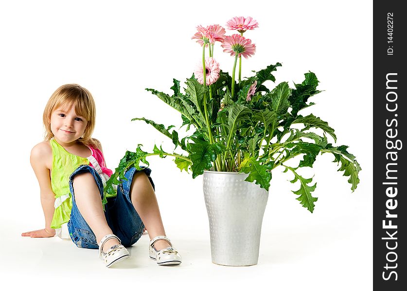 Cute little girl with the flowers. Studio shot. Cute little girl with the flowers. Studio shot