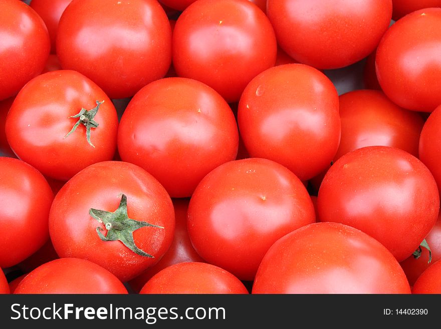 Red tomatoes arranged at the market