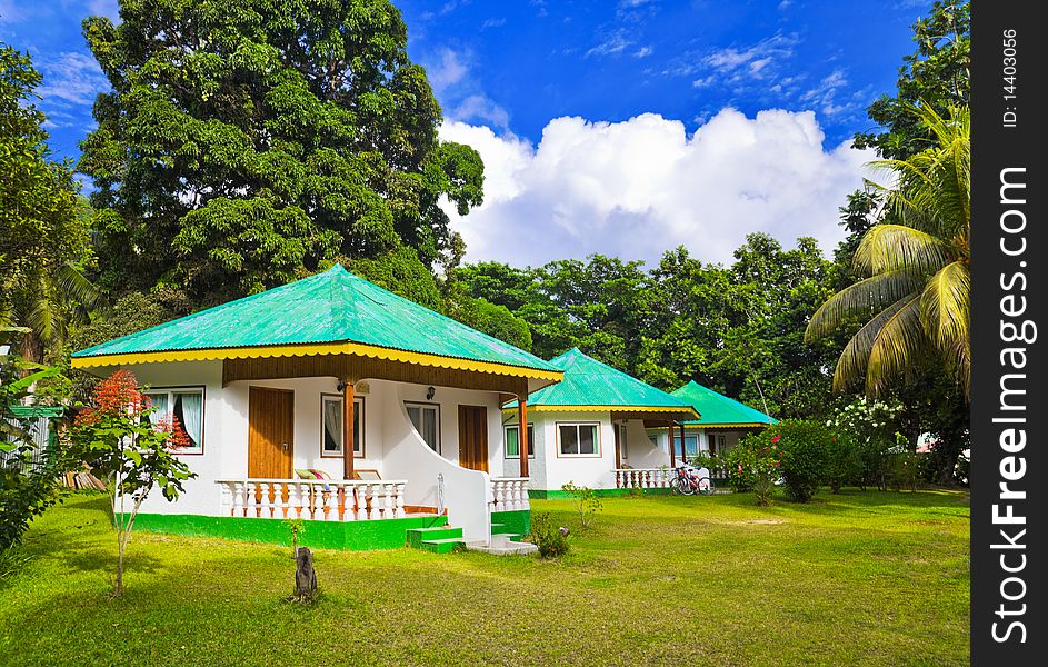 Bungalow in hotel at tropical beach - vacation background