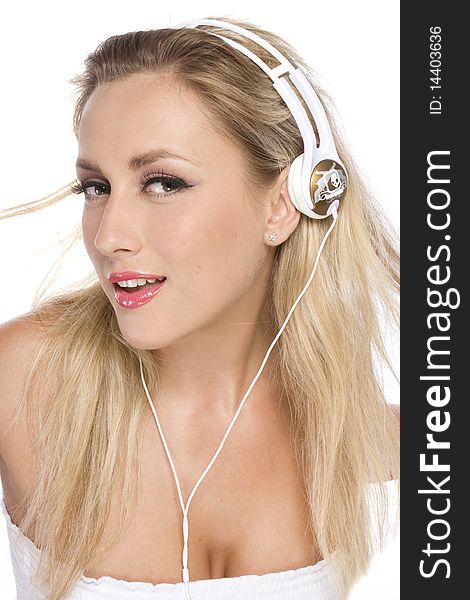 Women listenig to music in white headphone. Women listenig to music in white headphone