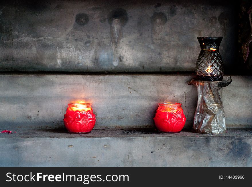 Candles burning, at the Longshan temple, Lukang, Taiwan. Longshan is a buddhist temple, one of the oldest in Lukang. Candles burning, at the Longshan temple, Lukang, Taiwan. Longshan is a buddhist temple, one of the oldest in Lukang.