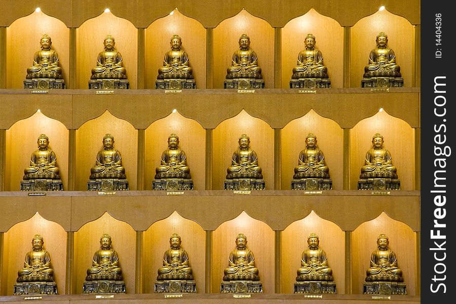 Bronze Buddha Statues in a Buddhist Temple