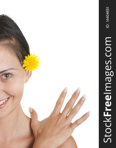 Young woman with yellow flower isolated in white